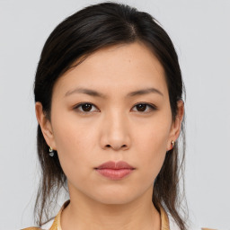 Neutral asian young-adult female with medium  brown hair and brown eyes