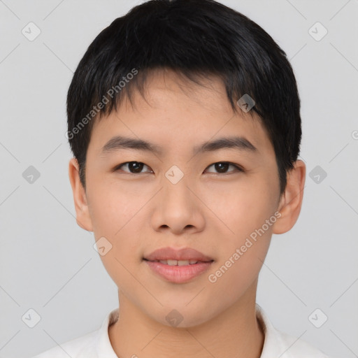 Joyful asian young-adult male with short  brown hair and brown eyes