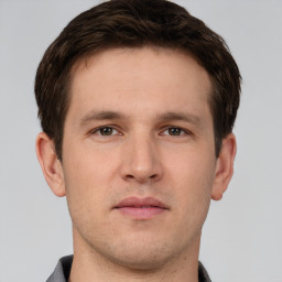 Neutral white young-adult male with short  brown hair and grey eyes