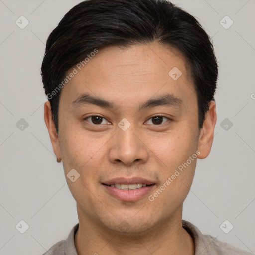 Joyful white young-adult male with short  black hair and brown eyes