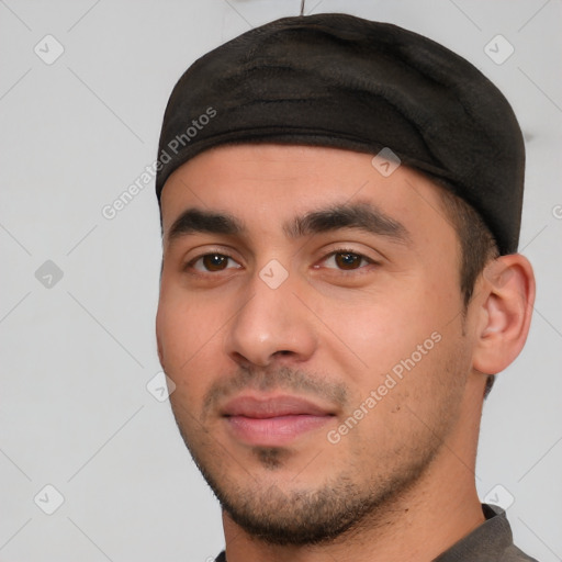 Joyful white young-adult male with short  black hair and brown eyes