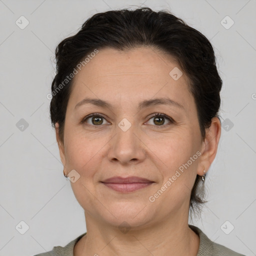 Joyful white adult female with short  brown hair and grey eyes