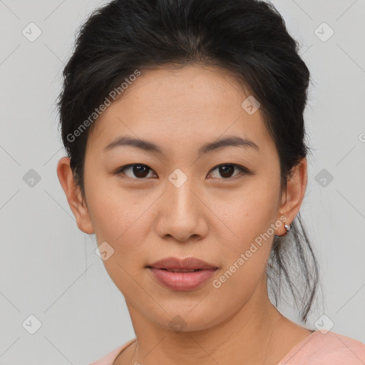 Joyful asian young-adult female with short  brown hair and brown eyes