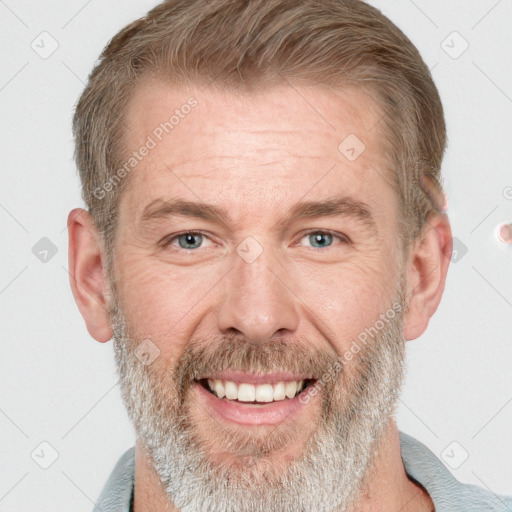 Joyful white middle-aged male with short  brown hair and grey eyes