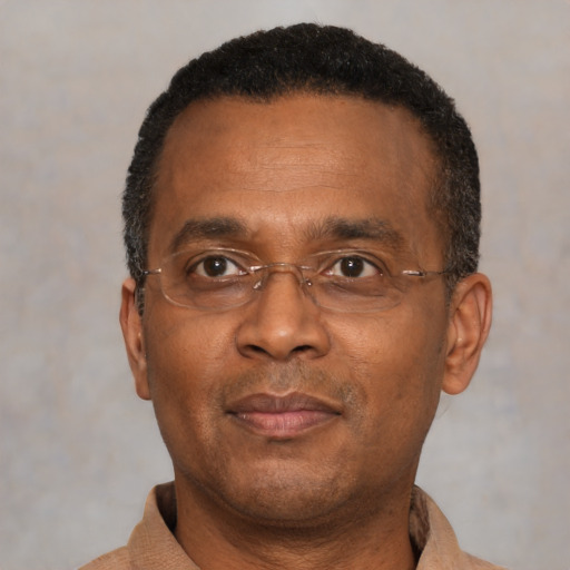 Neutral black adult male with short  black hair and brown eyes