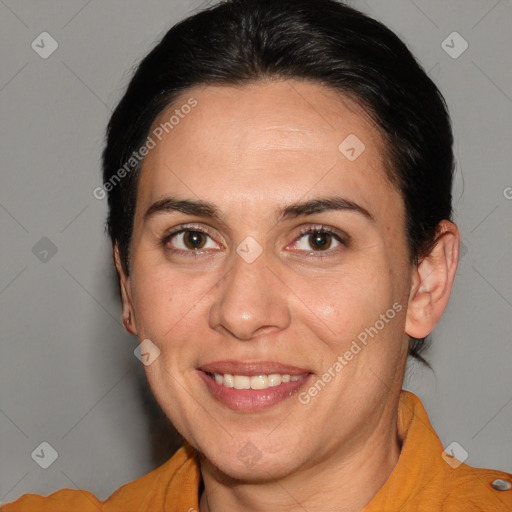 Joyful white adult female with medium  brown hair and brown eyes