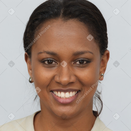 Joyful black young-adult female with short  brown hair and brown eyes