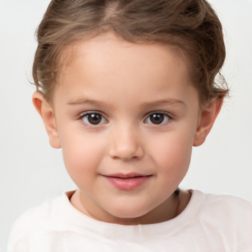 Joyful white child female with short  brown hair and brown eyes