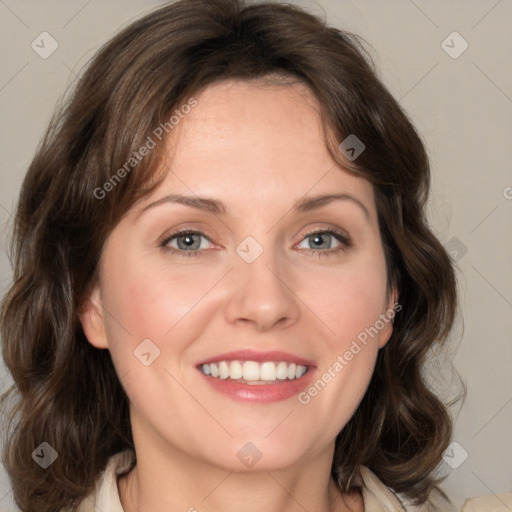 Joyful white young-adult female with medium  brown hair and green eyes