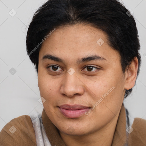 Joyful latino young-adult female with medium  brown hair and brown eyes