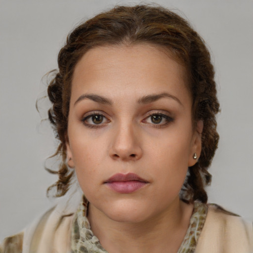 Neutral white young-adult female with medium  brown hair and brown eyes