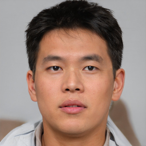 Neutral asian young-adult male with short  brown hair and brown eyes