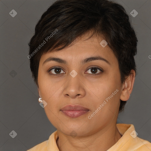 Joyful latino young-adult female with short  brown hair and brown eyes