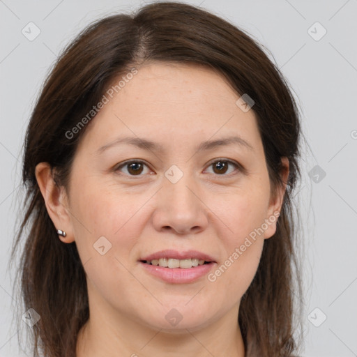 Joyful white adult female with medium  brown hair and brown eyes