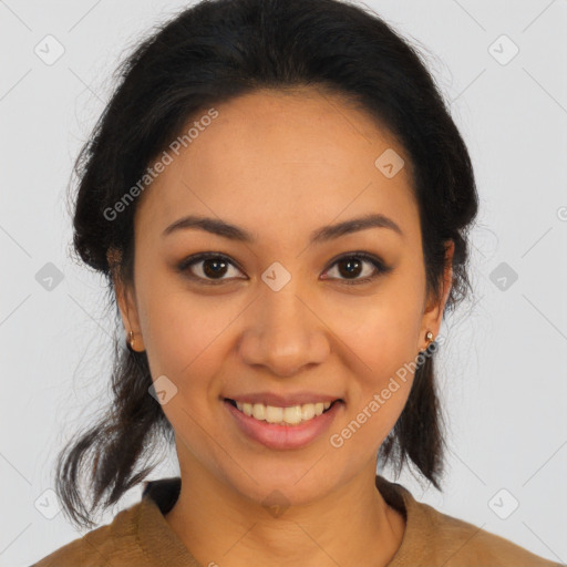 Joyful latino young-adult female with medium  brown hair and brown eyes