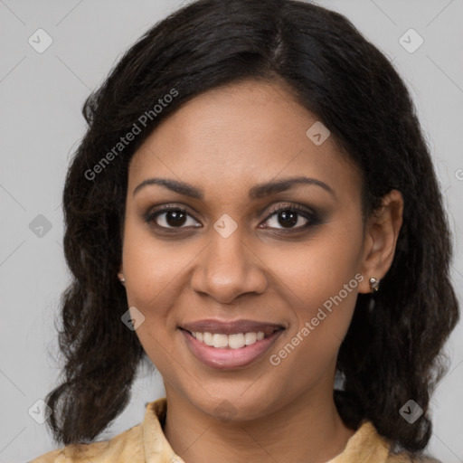 Joyful black young-adult female with medium  brown hair and brown eyes