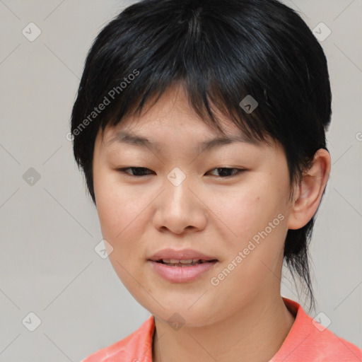 Joyful asian young-adult female with medium  brown hair and brown eyes