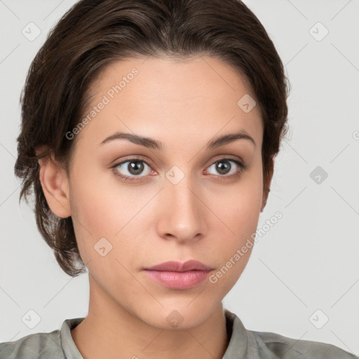 Neutral white young-adult female with medium  brown hair and brown eyes