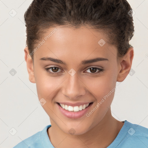 Joyful white child female with short  brown hair and brown eyes