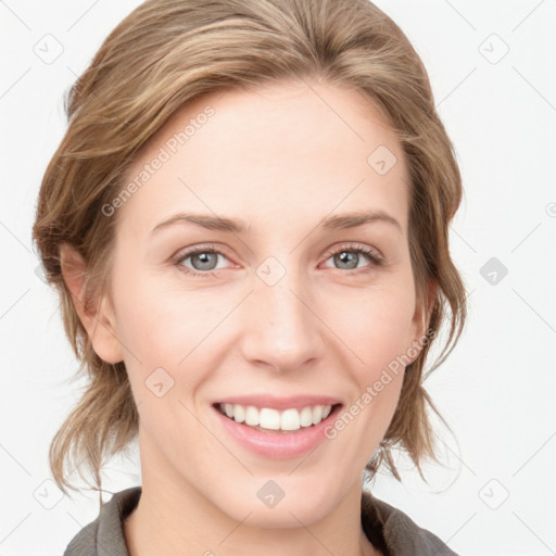 Joyful white young-adult female with medium  brown hair and blue eyes