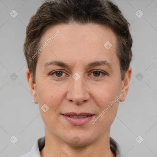 Joyful white adult female with short  brown hair and brown eyes