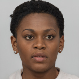 Neutral black young-adult female with short  brown hair and brown eyes