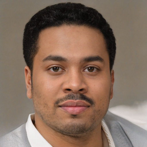 Neutral latino young-adult male with short  brown hair and brown eyes