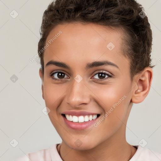 Joyful white young-adult female with short  brown hair and brown eyes