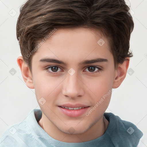 Joyful white child male with short  brown hair and brown eyes