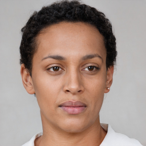Neutral latino young-adult female with short  brown hair and brown eyes