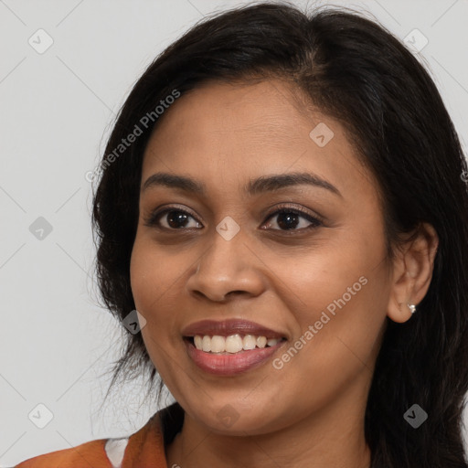 Joyful latino young-adult female with long  brown hair and brown eyes