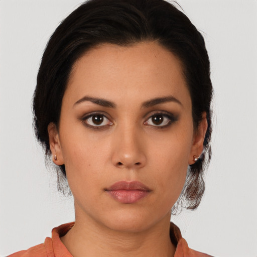 Neutral latino young-adult female with medium  black hair and brown eyes