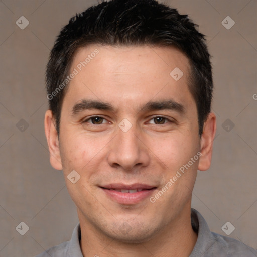 Joyful white adult male with short  brown hair and brown eyes