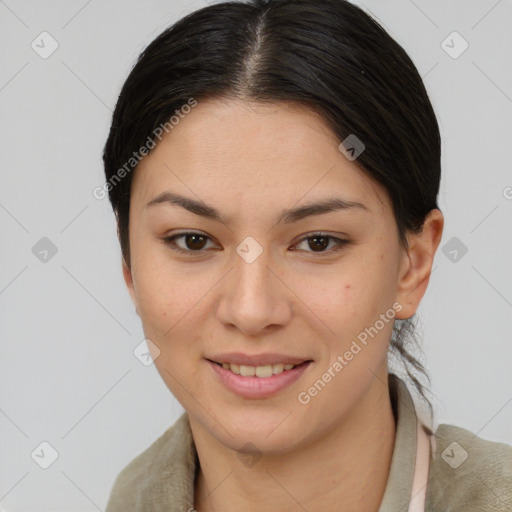 Joyful asian young-adult female with short  brown hair and brown eyes