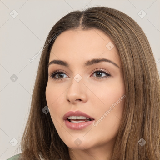 Neutral white young-adult female with long  brown hair and brown eyes