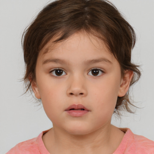 Neutral white child female with medium  brown hair and brown eyes