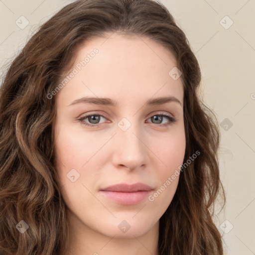 Joyful white young-adult female with long  brown hair and green eyes