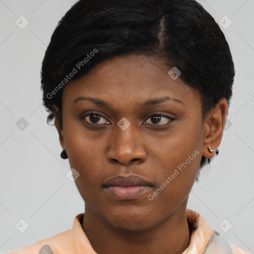Neutral black young-adult female with short  brown hair and brown eyes