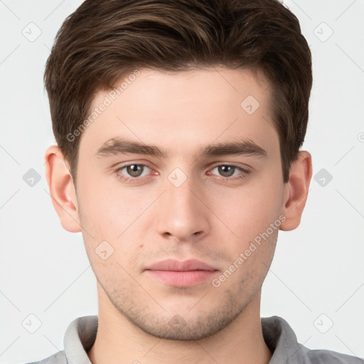 Neutral white young-adult male with short  brown hair and brown eyes