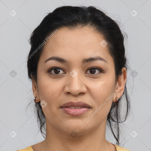 Joyful latino young-adult female with medium  brown hair and brown eyes