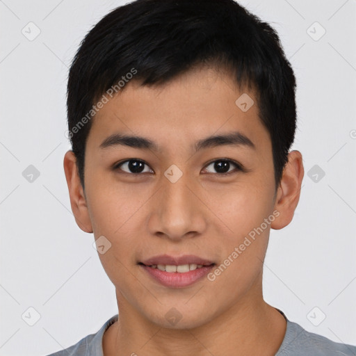 Joyful asian young-adult male with short  black hair and brown eyes