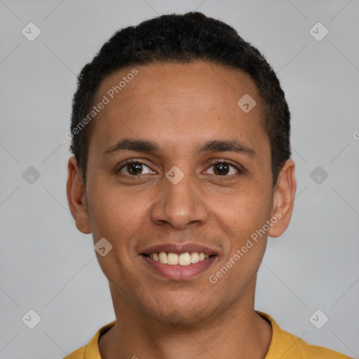 Joyful latino young-adult male with short  black hair and brown eyes