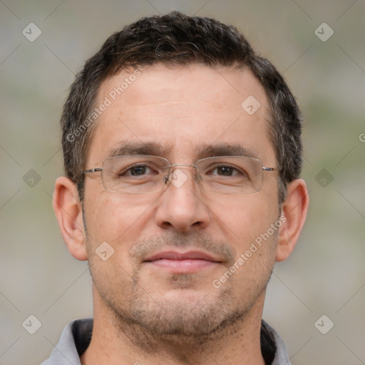 Joyful white adult male with short  brown hair and brown eyes