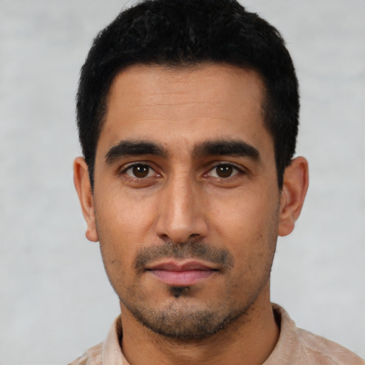 Neutral latino young-adult male with short  black hair and brown eyes