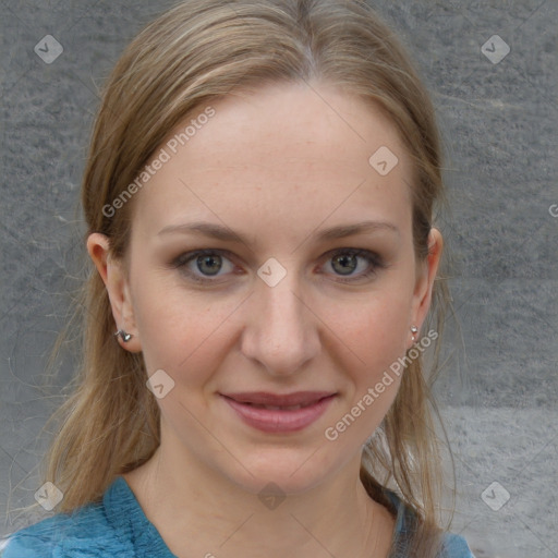 Joyful white young-adult female with medium  brown hair and blue eyes