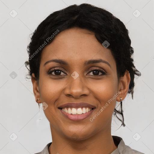 Joyful latino young-adult female with short  brown hair and brown eyes