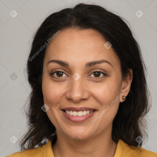 Joyful white adult female with medium  brown hair and brown eyes