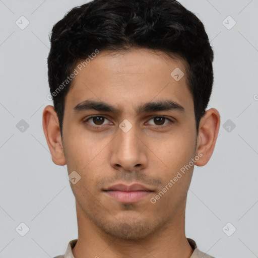 Neutral latino young-adult male with short  brown hair and brown eyes