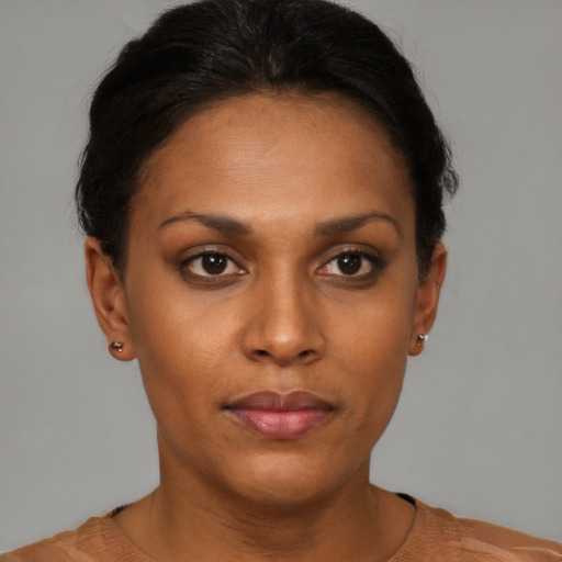 Neutral black young-adult female with short  brown hair and brown eyes