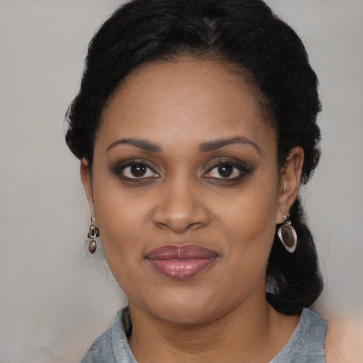 Joyful black young-adult female with medium  black hair and brown eyes